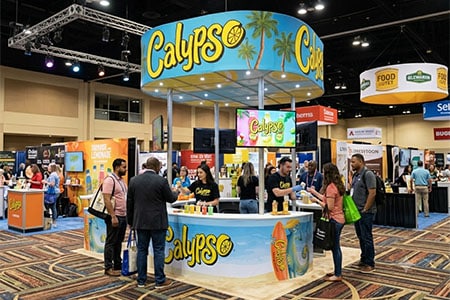 Calypso_custom display_450x300 booth_rental_10x10_300x250