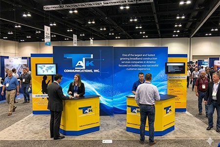 TAK_custom display_450x300 booth_rental_10x10_300x250